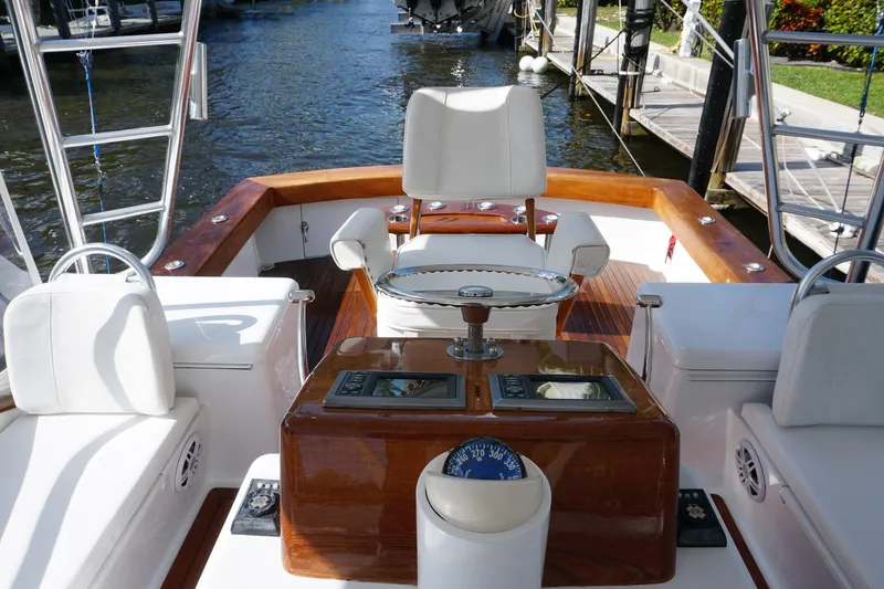  Yacht Photos Pics 2010 Scopinich 35 EXPRESS boat interior with white seating and wooden accents.