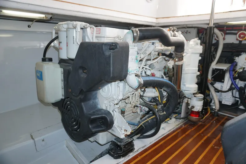  Yacht Photos Pics Engine room of 2010 Scopinich 35 EXPRESS boat, showcasing detailed mechanical components.
