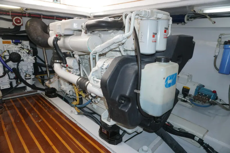  Yacht Photos Pics Engine room of 2010 Scopinich 35 EXPRESS boat, showcasing detailed mechanical components.
