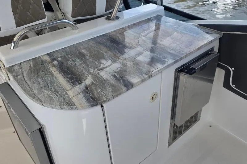 Blue Bird Yacht Photos Pics Luxurious marble countertop on 2008 Neptunus Flybridge MY yacht, featuring sleek design elements.