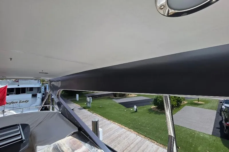 Blue Bird Yacht Photos Pics 2008 Neptunus Flybridge MY yacht docked, featuring sleek design and spacious deck area.