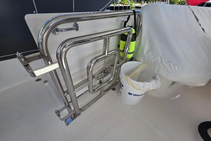 Blue Bird Yacht Photos Pics Stainless steel railing and bucket on 2008 Neptunus Flybridge MY yacht deck.