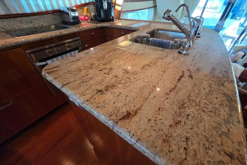 Blue Bird Yacht Photos Pics Luxurious granite countertop in 2008 Neptunus Flybridge MY yacht kitchen.