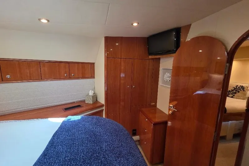 Blue Bird Yacht Photos Pics Luxurious cabin interior of 2008 Neptunus Flybridge MY yacht with wood finish.
