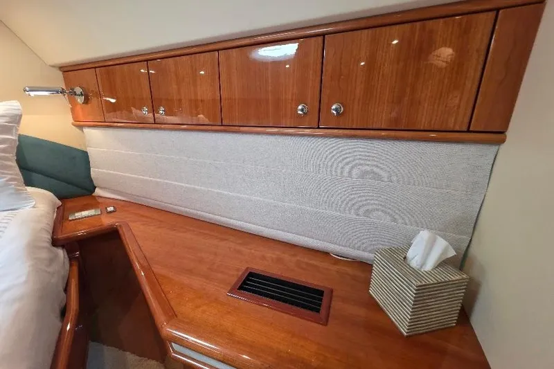 Blue Bird Yacht Photos Pics Luxurious 2008 Neptunus Flybridge MY cabin interior with wood cabinetry and elegant design.