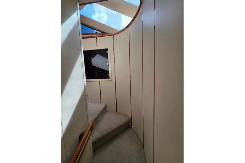 Blue Bird Yacht Photos Pics Interior staircase of 2008 Neptunus Flybridge MY yacht with skylight.