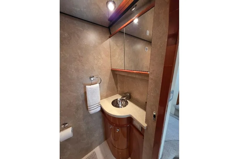 Blue Bird Yacht Photos Pics Luxurious bathroom in 2008 Neptunus Flybridge MY yacht with elegant fixtures.