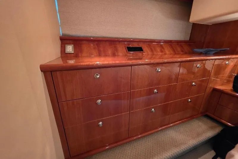 Blue Bird Yacht Photos Pics Luxurious wooden cabinetry inside a 2008 Neptunus Flybridge MY yacht interior.