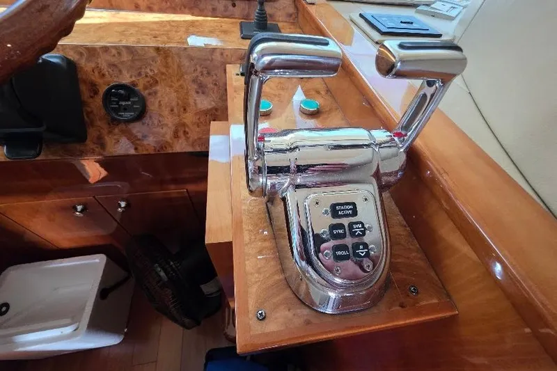 Blue Bird Yacht Photos Pics Control panel of a 2008 Neptunus Flybridge MY yacht with dual throttle levers.