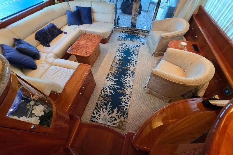 Blue Bird Yacht Photos Pics Luxurious interior of 2008 Neptunus Flybridge MY yacht with elegant seating and decor.