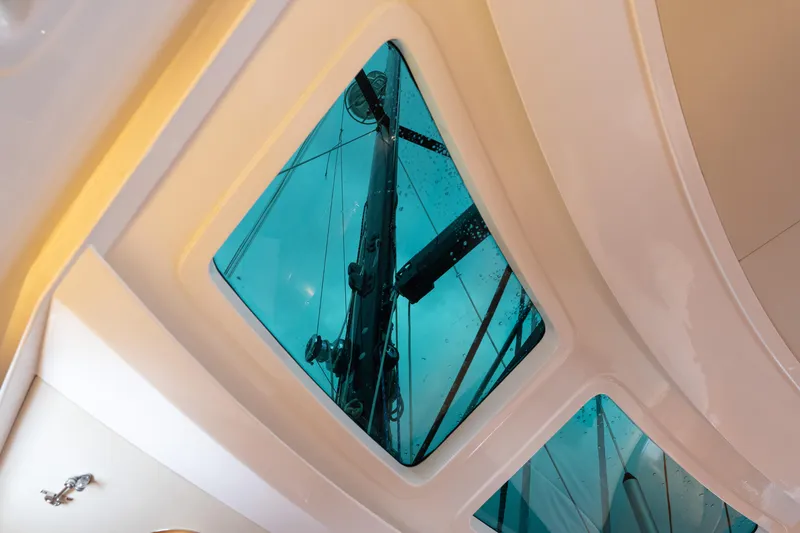 Solitude Yacht Photos Pics View through skylight of 2018 Passport Vista 545 Center Cockpit, showing mast and rigging.
