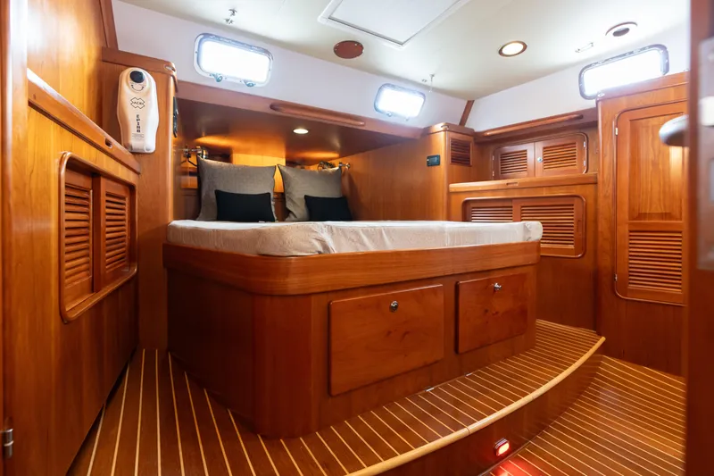 Solitude Yacht Photos Pics Luxurious interior of 2018 Passport Vista 545 Center Cockpit yacht with wooden finishes.