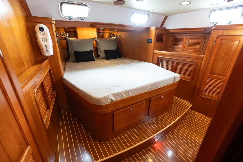 Solitude Yacht Photos Pics Luxurious wooden cabin interior of 2018 Passport Vista 545 Center Cockpit yacht.