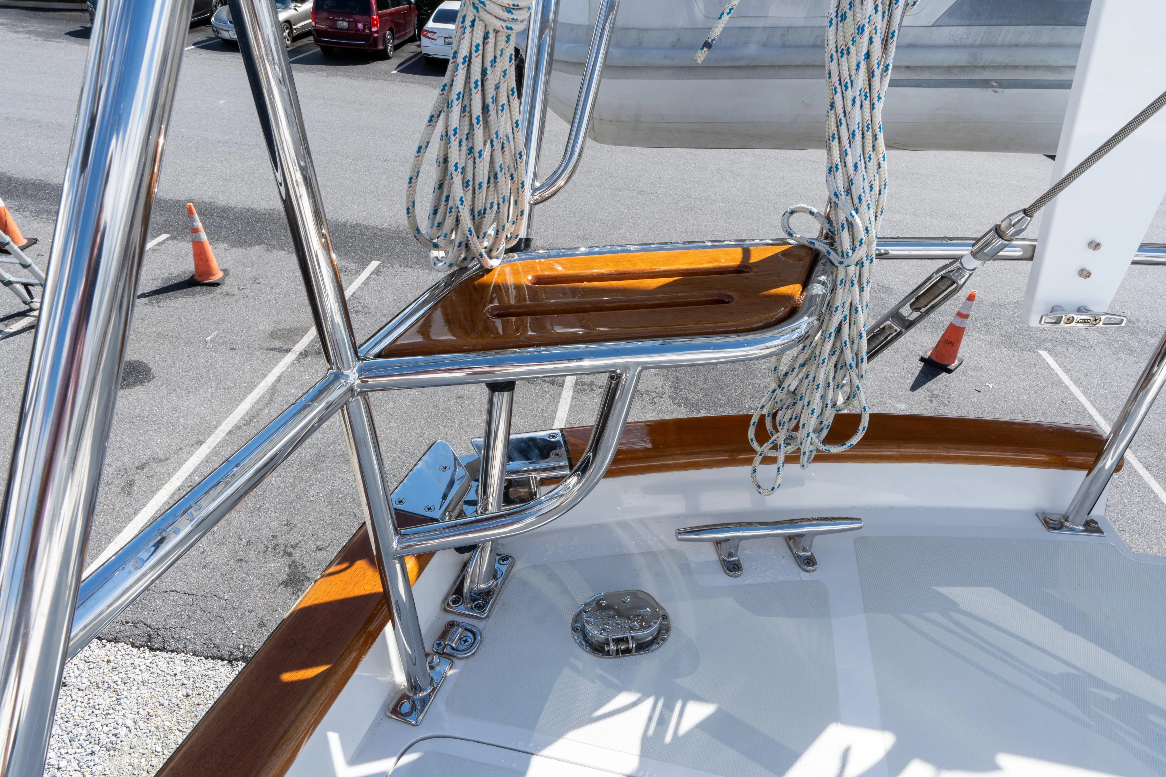 Solitude Yacht Photos Pics Stainless steel and wood details on 2018 Passport Vista 545 Center Cockpit sailboat.