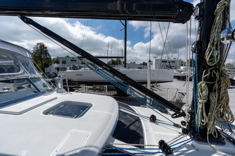 Solitude Yacht Photos Pics Sailboat deck view of 2018 Passport Vista 545 Center Cockpit, featuring rigging and clear skies.