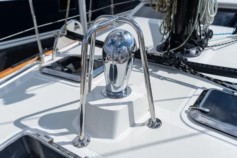 Solitude Yacht Photos Pics 2018 Passport Vista 545 Center Cockpit deck with polished chrome fittings and rigging details.