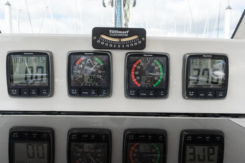 Solitude Yacht Photos Pics Instrument panel of 2018 Passport Vista 545 Center Cockpit sailboat with Raymarine displays.