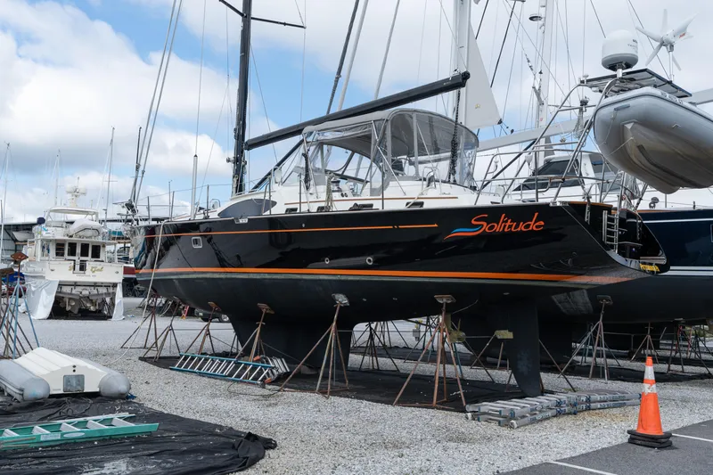 Solitude Yacht Photos Pics 2018 Passport Vista 545 Center Cockpit yacht "Solitude" on stands in a boatyard.