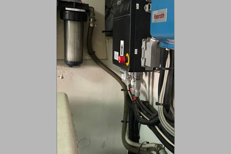  Yacht Photos Pics Engine room components of a 2004 Princess V65 yacht, featuring Rexroth equipment and wiring.