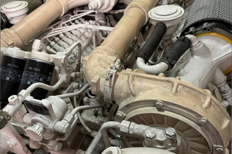  Yacht Photos Pics Engine components of a 2004 Princess V65 yacht, showcasing intricate mechanical details.