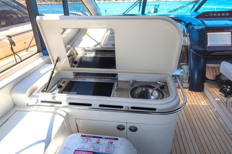  Yacht Photos Pics Luxury yacht Princess V65 interior with kitchenette and sink, 2004 model.