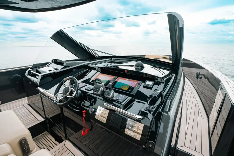  Yacht Photos Pics 2022 Fjord 52 Open yacht cockpit with modern navigation equipment and ocean view.