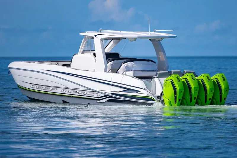  Yacht Photos Pics 2026 Deep Impact 399 Sport boat with four green outboard engines on calm water.