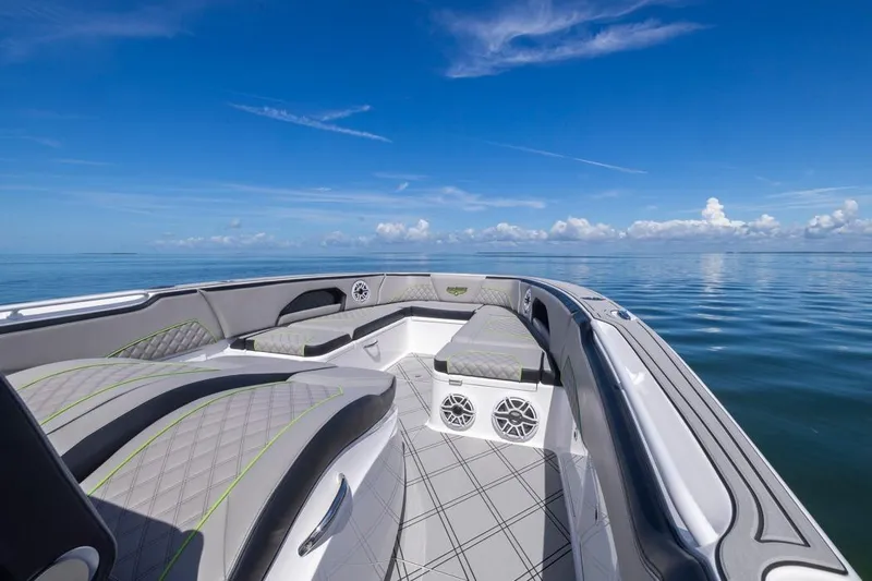  Yacht Photos Pics Luxury interior of 2026 Deep Impact 399 Sport boat on calm ocean waters.