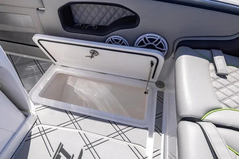  Yacht Photos Pics Open storage compartment in 2026 Deep Impact 399 Sport boat interior.
