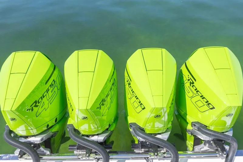  Yacht Photos Pics Four neon green Racing 450 outboard motors on a 2026 Deep Impact 399 Sport boat.