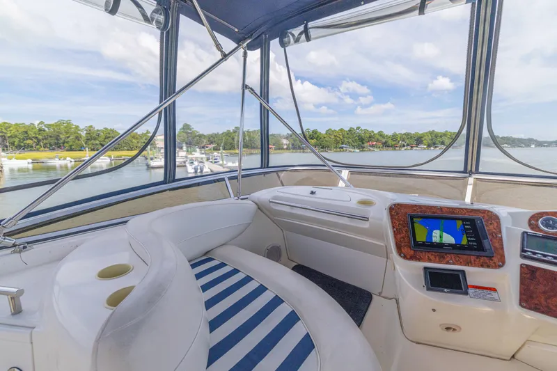  Yacht Photos Pics Interior view of 2006 Meridian 341 Sedan yacht with navigation system and scenic waterway.