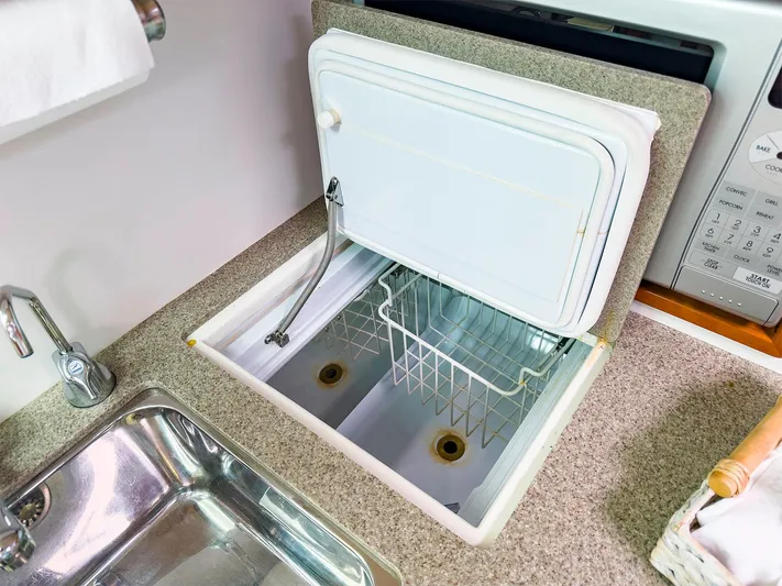 4750fr Yacht Photos Pics 2012 MJM 40z Downeast boat galley with sink and built-in cooler.