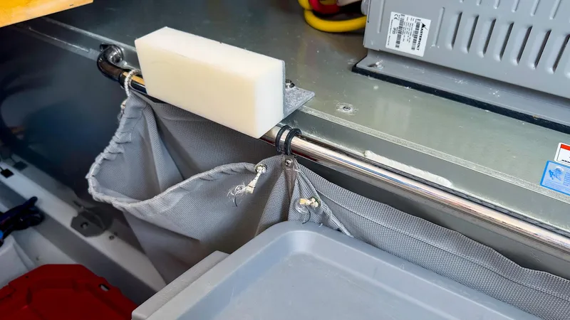 4750fr Yacht Photos Pics 2012 MJM 40z Downeast boat interior with storage compartment and equipment.