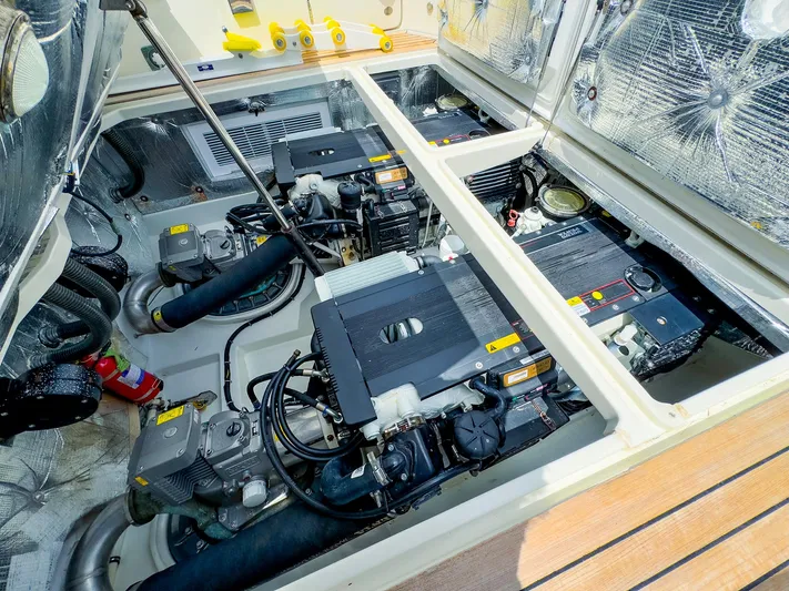 4750fr Yacht Photos Pics Engine compartment of a 2012 MJM 40z Downeast boat, showcasing dual engines.