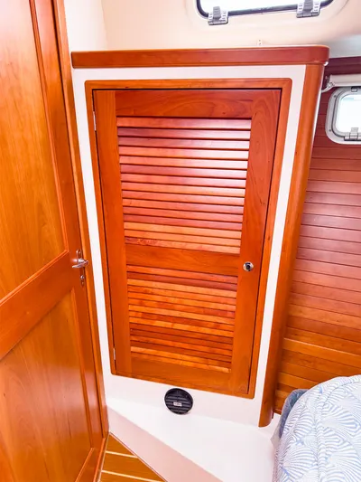 4750fr Yacht Photos Pics Wooden cabinet door inside 2012 MJM 40z Downeast boat cabin interior.