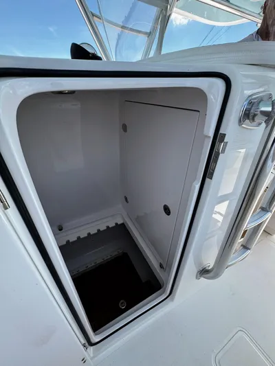 Teasin' II Yacht Photos Pics Open storage compartment on a 2019 Bahama 41 Center Console boat.