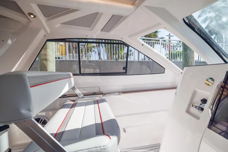  Yacht Photos Pics Interior of 2026 Solara S-310 SB boat with sleek seating and modern design.