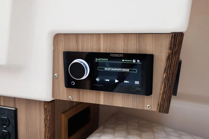  Yacht Photos Pics Audio control panel in Solara S-310 SB, 2026 model, featuring Bluetooth connectivity.