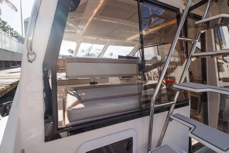  Yacht Photos Pics Interior view of 2026 Solara S-310 SB yacht with modern seating and sleek design.