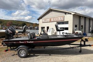 2026 Tracker Bass Tracker Classic XL boat at Flash Marina, under cloudy sky.