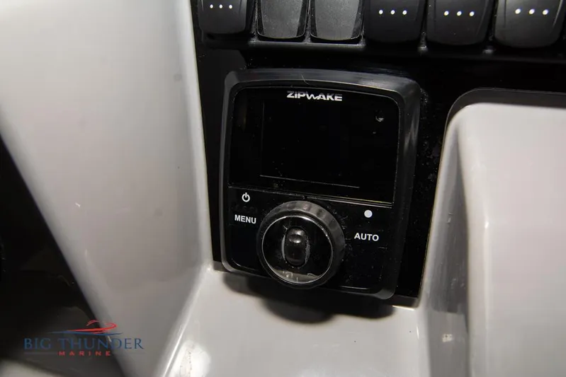  Yacht Photos Pics Control panel of a 2022 Jeanneau Leader 10.5 boat with Zipwake system.