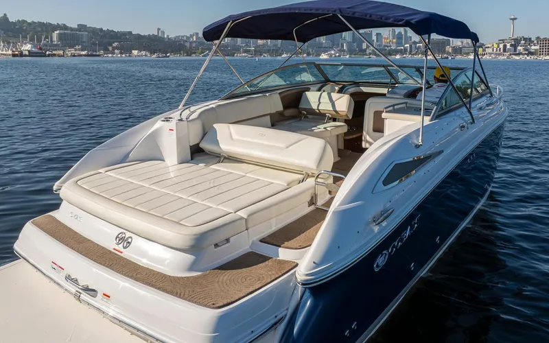 Cobalt Yacht Photos Pics 2008 Cobalt 303 boat with white seating and blue hull on a sunny day.