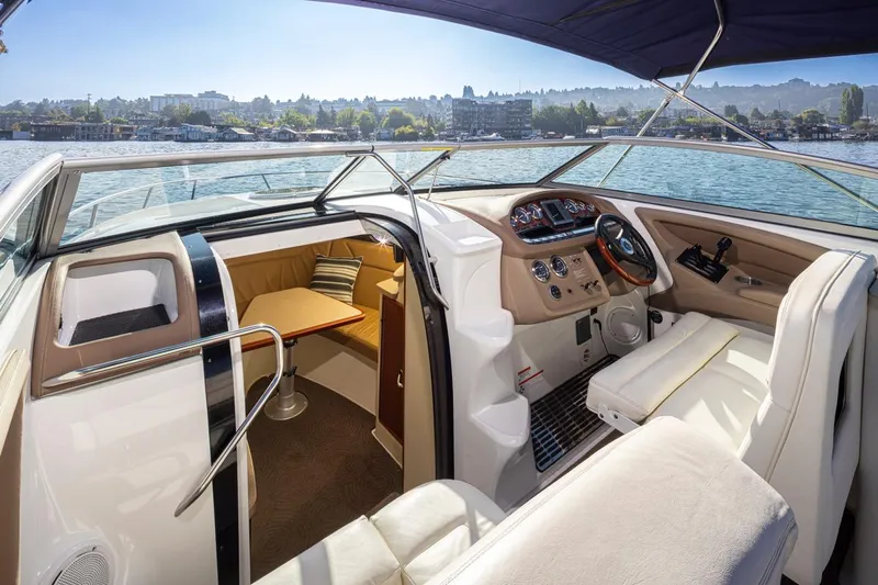 Cobalt Yacht Photos Pics Interior of a 2008 Cobalt 303 boat with a view of the cockpit and seating area.