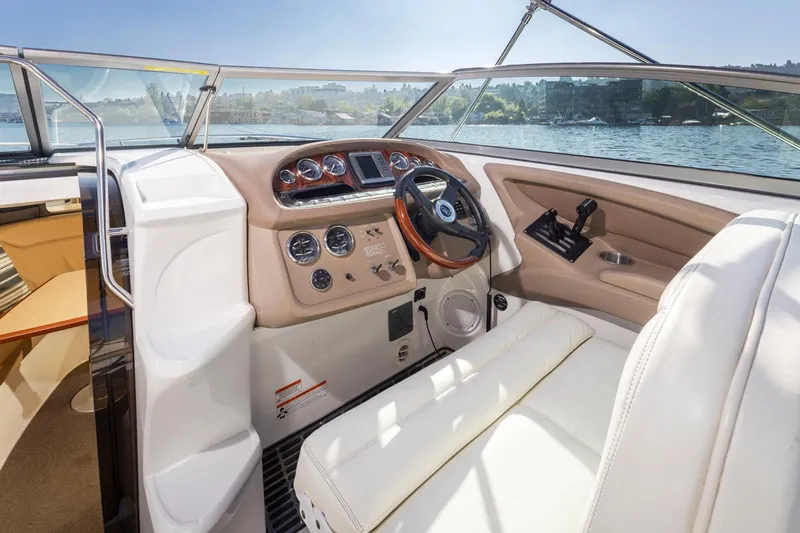 Cobalt Yacht Photos Pics 2008 Cobalt 303 boat cockpit with steering wheel and control panel.