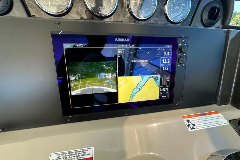  Yacht Photos Pics Simrad navigation display on 2009 Sea Ray 48 Sundancer boat dashboard.