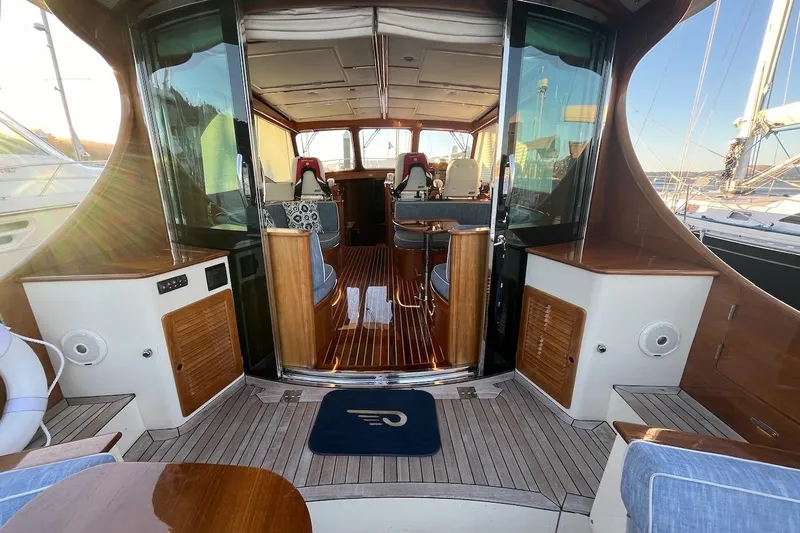 Cassidy Yacht Photos Pics 2013 Hinckley Talaria 48 MY yacht interior with elegant wood finishes and seating.