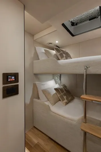 2026 Moon 60 Sail New Yacht Photos Pics Luxurious 2026 Moon 60 Sail yacht cabin with cozy bunk beds and modern design.
