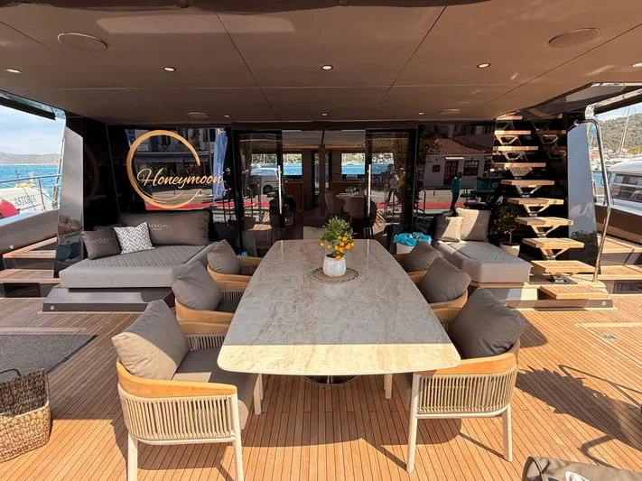 2026 Moon 60 Sail New Yacht Photos Pics Luxurious 2026 Moon 60 Sail yacht interior with elegant seating and dining area.