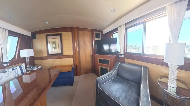 Carry On Yacht Photos Pics Luxurious interior of 1982 Hatteras 65 LRC yacht with elegant furnishings.