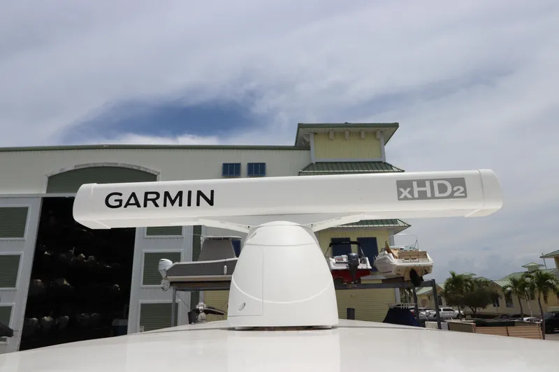  Yacht Photos Pics Garmin xHD2 radar on 2020 Wellcraft 302 Fisherman boat, marina background.